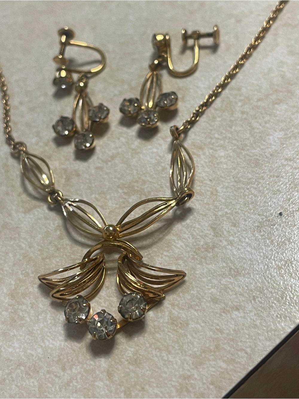 Delicate Gold-Tone Floral Pendant Necklace with Clear Crystal Accents